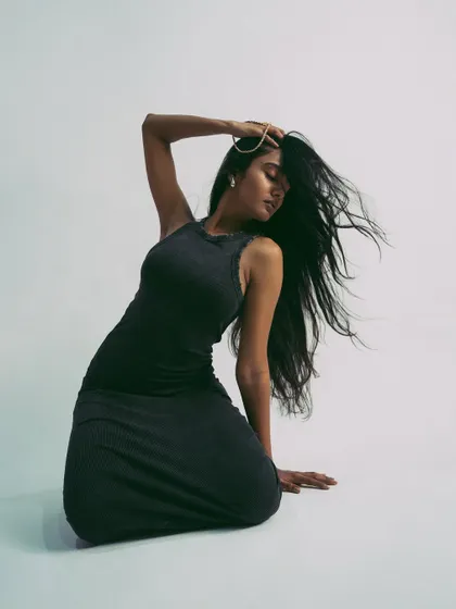 Capturing motion with a simple hair flip. This adds a dynamic element to an otherwise minimal studio shoot.