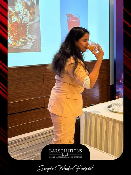 The best part of learning is tasting the results. Amisha samples the finished product, a key step in understanding flavor balance during our masterclasses.