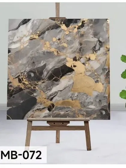 This dark, dramatic marble design (WMB-072) features a mix of black, grey, and white with bold splashes of gold for a powerful statement.