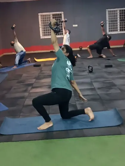 A dynamic group class blending yoga with kettlebells for a unique strength and mobility challenge. This is how we keep workouts interesting and functional.
