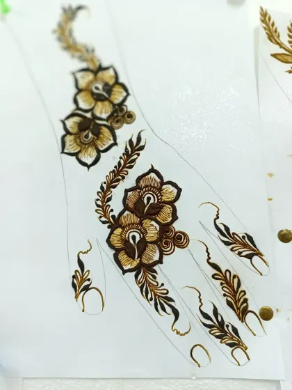Another view of my practice sheet, showing the details of the floral design.