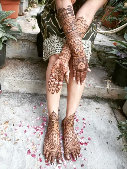 Another view of our team's bridal creation. The combination of hand and foot mehendi creates a complete and stunning look for the bride.