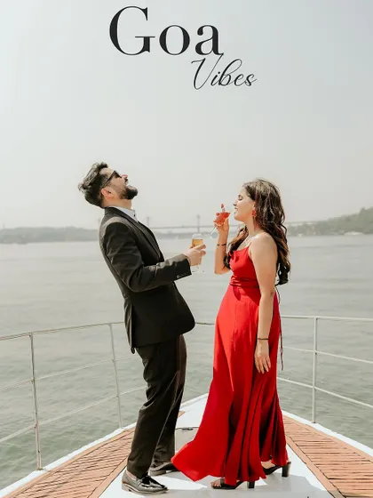 "Goa Vibes" captured perfectly in this fun and candid shot of the couple enjoying a drink on a yacht.
