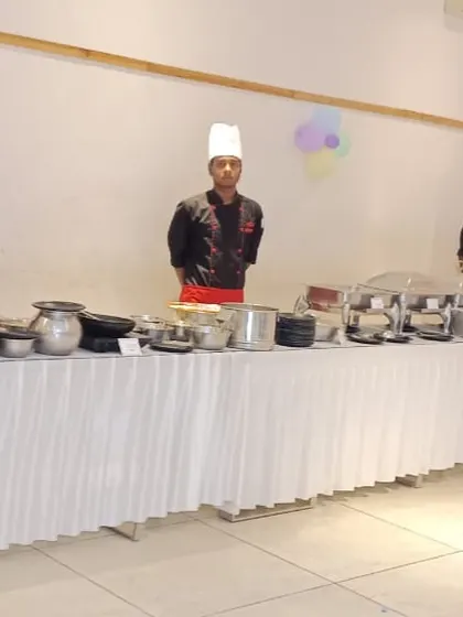 Our chefs and buffet line ready for a birthday celebration. We handle all the food arrangements so you can enjoy the party with your guests.