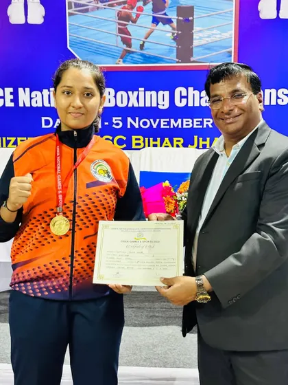 Prisha Pawar receiving her certificate and gold medal at the All India CISCE National Games. This victory is a result of consistent training and a champion's mindset, which we instill in all our fighters.