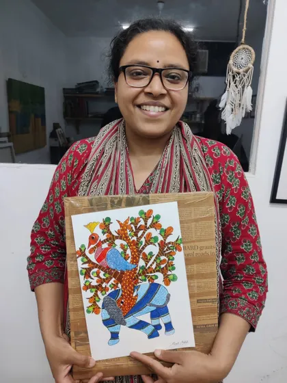 More images of our adult students finding their flow, working on their paintings, and proudly displaying the beautiful art they've created in our supportive studio environment.