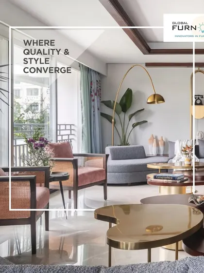 A living room where quality and style converge, featuring a mix of modern furniture, metallic accents, and lush plants.