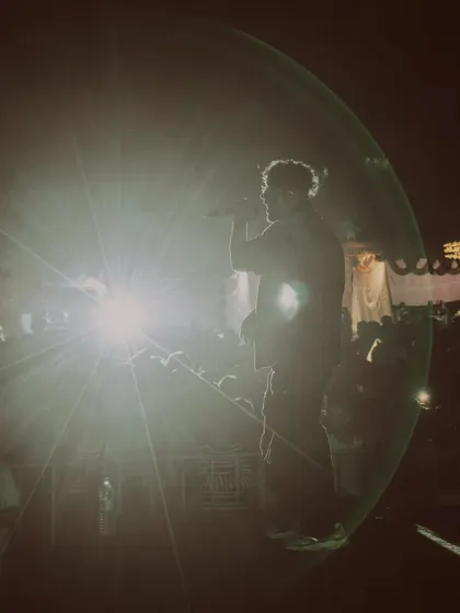 A silhouette against the stage light. Sometimes the vibe is just about the music and the atmosphere.