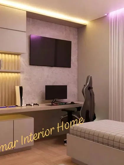 A wider view of the gaming room, showing the bed and the textured accent wall.