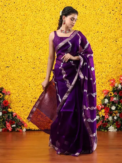 Another view of the purple and silver organza saree, highlighting its modern and artistic design.