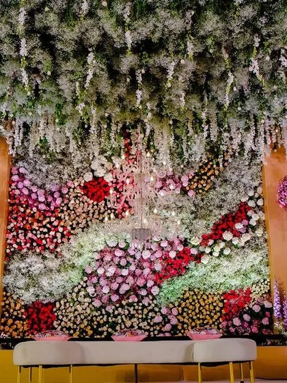 A closer look at the floral wall from the 'Starry Night' theme. The intricate arrangement of different flowers and colors creates a stunning tapestry of natural beauty.