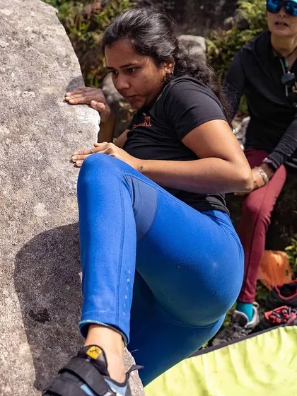 A climber in our Sethan event maintains her balance and composure on the rock. Each climb is a lesson in body awareness and problem-solving.
