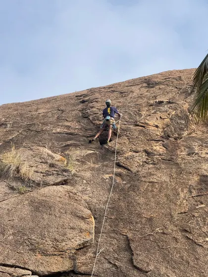 Raghava making the spicy 5.10b climb "Prema’s chapathi dough" look easy. This route is a local classic, known for its technical slab moves that test your footwork and balance.