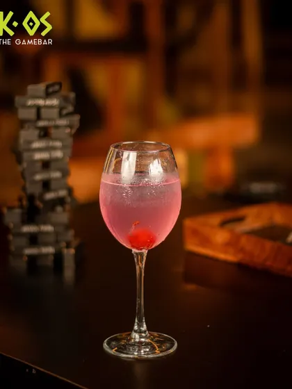 This vibrant pink cocktail is as bold and flavorful as it looks. It's the perfect companion to a game of Tipsy Tower.