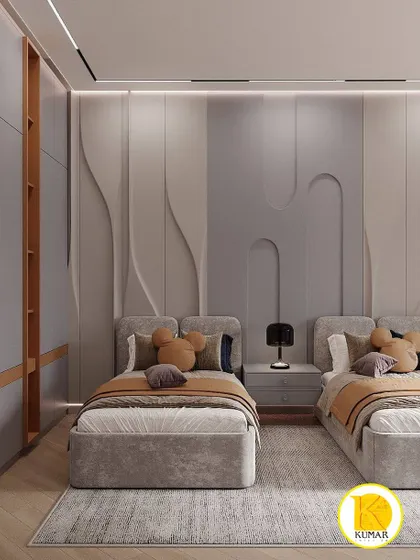 A frontal view of the twin beds with their unique, curved headboards.