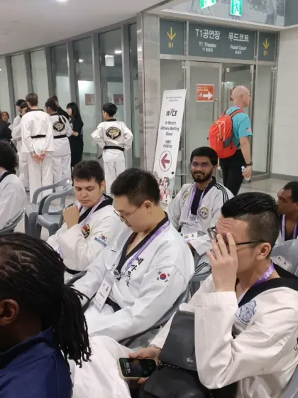 With fellow practitioners from around the world, waiting for our turn to train or compete.