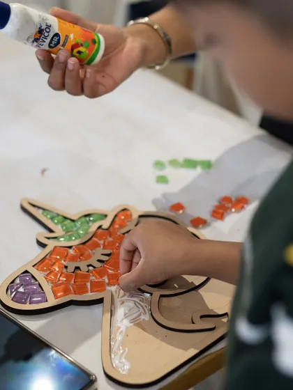 Art is a magical way to connect. Here, two generations are creating a beautiful unicorn mosaic together, one colorful tile at a time. These are the moments that turn into cherished memories, all while making a masterpiece.