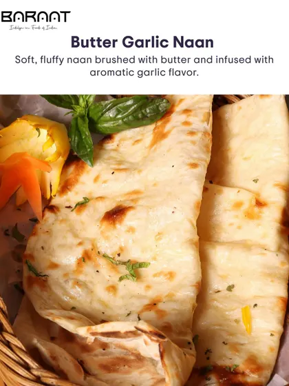 Another look at our aromatic Butter Garlic Naan, freshly baked and ready to be torn and dipped.