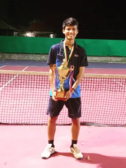 Vansh with his trophy after winning the silver medal at the National School Games.