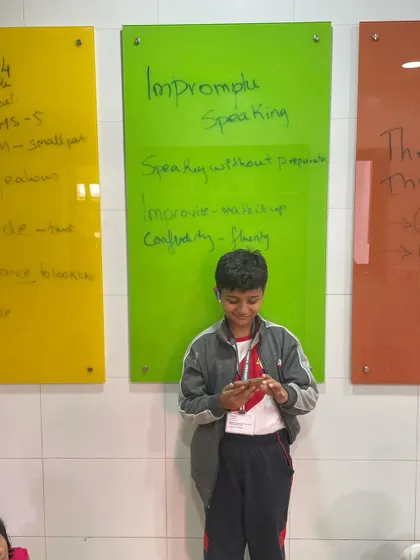 A mobile phone becomes the subject of an impromptu talk. We teach students that inspiration is everywhere, helping them develop the skills to speak confidently about any topic.
