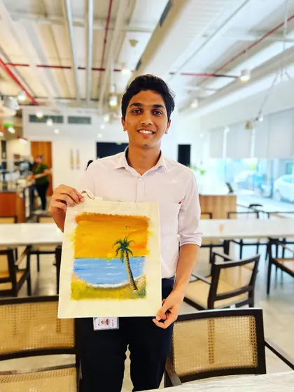 A beautifully painted tote bag with a serene beach scene. Participants are always amazed at what they can create, even as beginners.