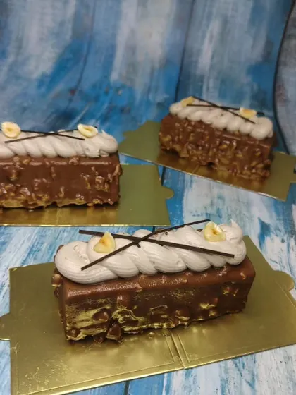 These hazelnut mousse pastries are a perfect example of the sophisticated desserts you will learn to make. We focus on texture, flavor balance, and professional presentation.