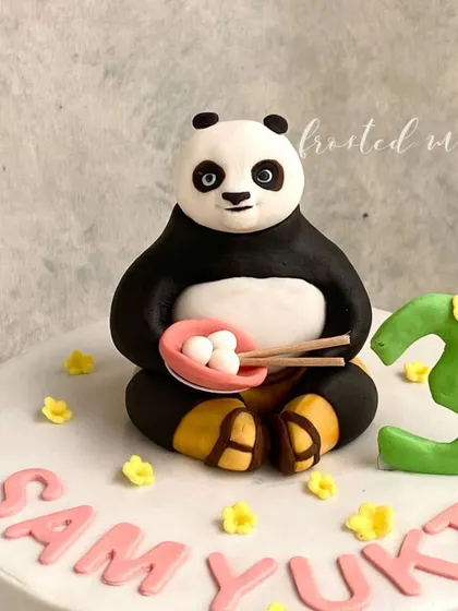 This Kung Fu Panda cake topper was so much fun to make! Po is enjoying his bowl of dumplings, all ready for a third birthday celebration.