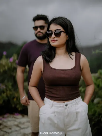 A cool, stylish portrait of the couple with sunglasses, showing a more modern and edgy side to their pre-wedding shoot.