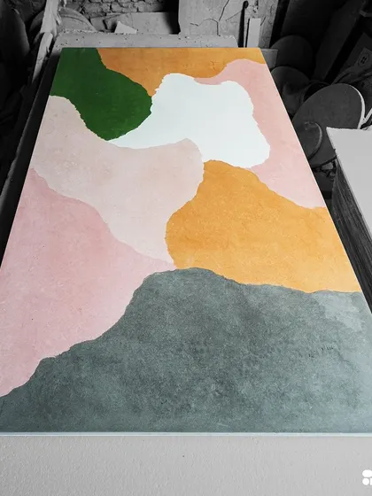 Another angle of the custom concrete slab, highlighting the organic flow of the different colored sections.