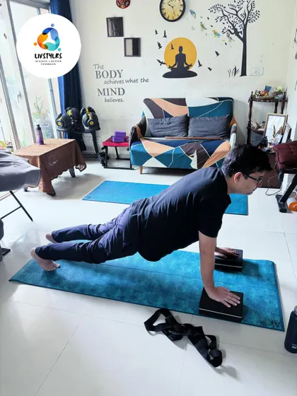 Using yoga blocks for push-ups increases the range of motion and deepens the chest engagement. It's a simple modification I use to help clients progress and build upper body strength safely.