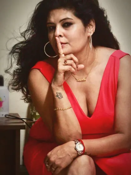 A powerful portrait in the red gown. The secret to great style is owning your look with confidence.