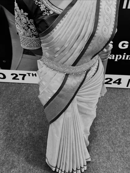 A black and white photo that emphasizes the clean lines and structure of the fluffy pleats.
