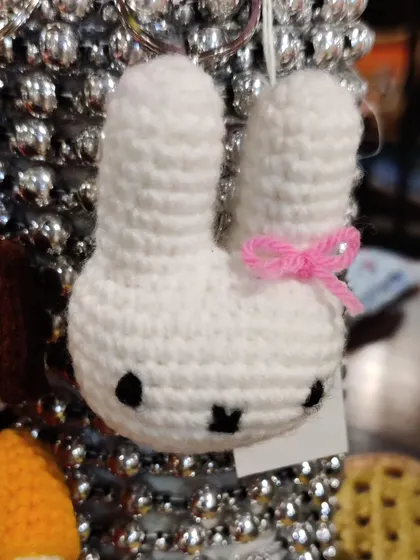 A Miffy-style bunny head keychain.