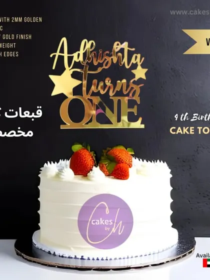 This "Adrishta turns ONE" topper in classic gold acrylic is a popular choice for first birthdays. Its bold design ensures it stands out on any cake.