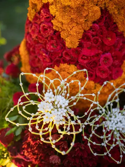 A macro view of the intricate jasmine bud work, showcasing the precision and patience required to create these stunning details.
