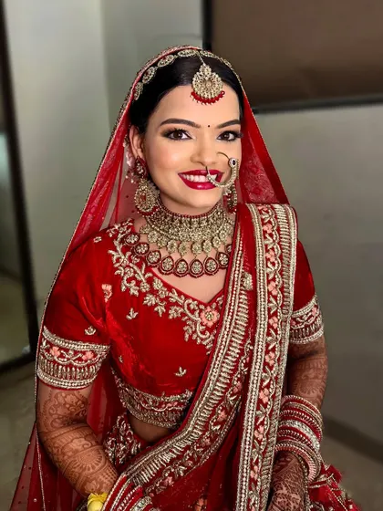 The joy on a bride's face is the best reward. Her makeup is flawless and radiant, with a smile that shows her confidence.