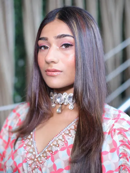 Embracing beauty with a soft pink makeup look. This is a lovely choice for a bridesmaid, as it's fresh, youthful, and photographs beautifully.