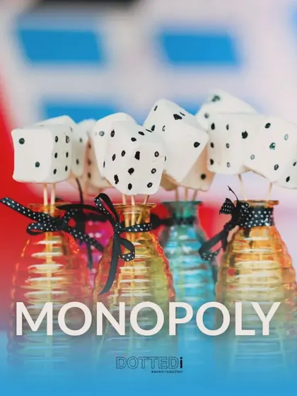 A creative and tasty detail from the Monopoly party: marshmallow "dice" served in small glass jars. It's a simple touch that guests loved.