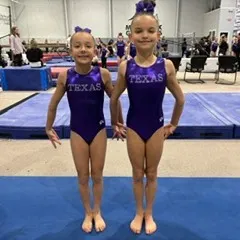 Teammates ready to compete at the Level 4 State Championships, concluding their compulsory season.