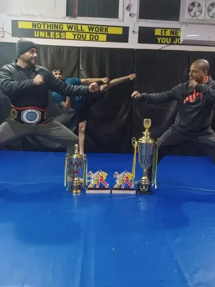 Every action is a performance. Posing with our champion and our trophies, representing the success and spirit of the Dynamic Squad.
