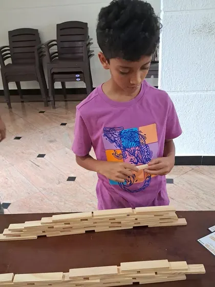 The focus in the room is always so real and inspiring. Each child gets their own set of planks and a space to bring their ideas to life, learning about balance and dedication through hands-on building.