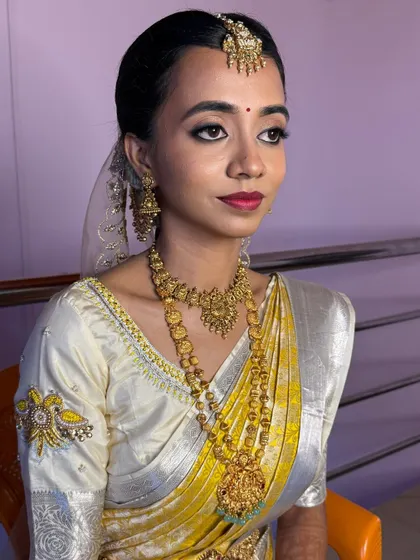 My beautiful bride Aishwarya on her wedding day. She wanted bold dark lips paired with elegant golden shimmery eyes, and the result was stunning.
