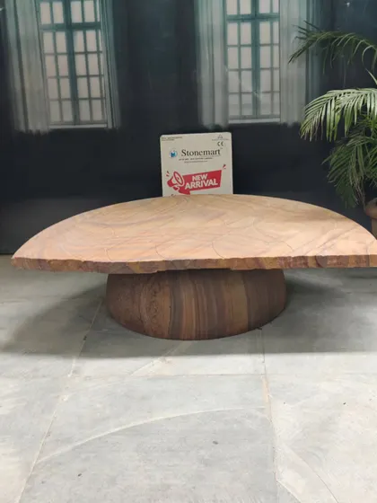 A side profile of our modern stone bench, highlighting its clean lines and the beautiful grain of the sandstone. It measures 4 feet in length, providing comfortable seating.