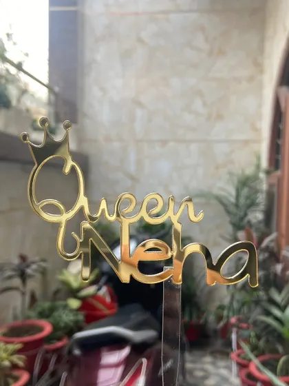 For the queen in your life! This "Queen Neha" topper with a crown detail is a fun and empowering design for any birthday.