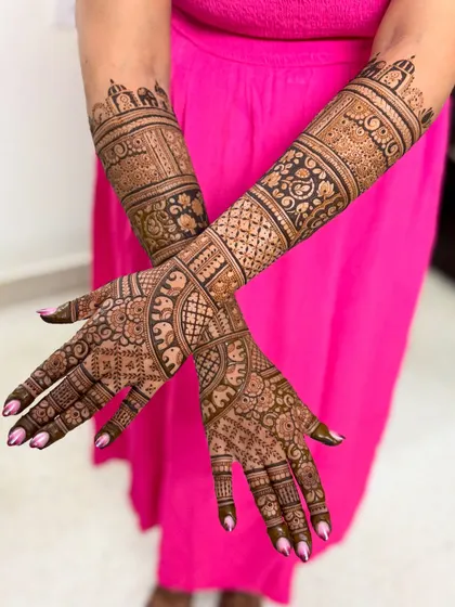 Another crossed-arm view, showing the design on the back of the hands.