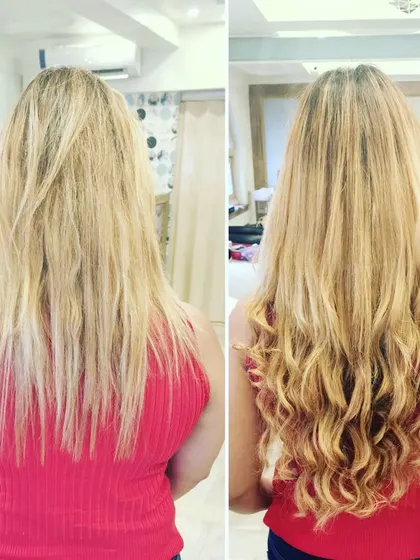 This client with blonde hair wanted more volume and texture. The wavy extensions blend perfectly and add the desired fullness.