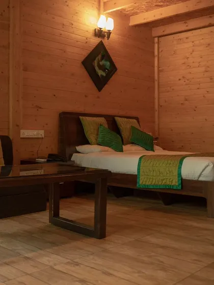 The interior of one of my cozy wooden chalets, offering a rustic and warm retreat after a day of adventure.
