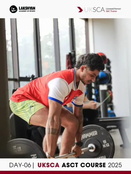 A participant performs a deadlift during the foundational movement assessment on Day 6, demonstrating their technical proficiency.