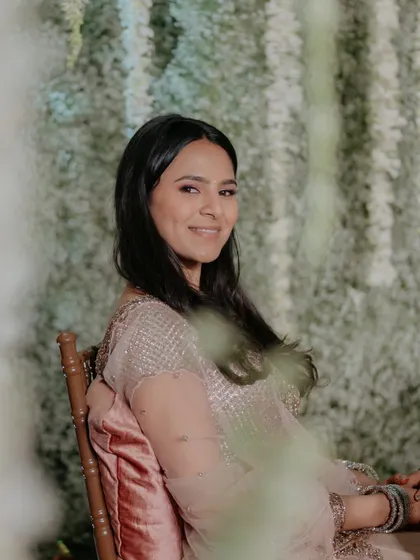A beautiful portrait of the bride's sister. The makeup is minimal and fresh, perfect for a daytime wedding event.