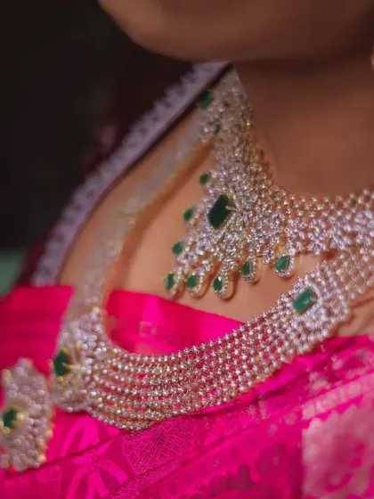 The intricate details of a diamond-look necklace, perfect for adding glamour to a reception or sangeet outfit.